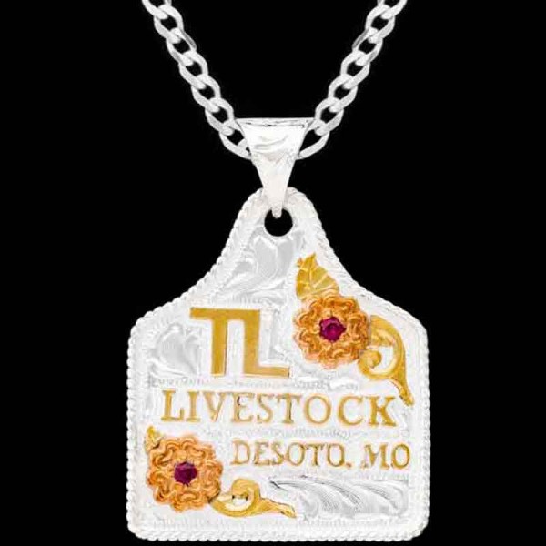 Our Flossie Cow Tag Necklace is a radiant piece crafted on a Silver Plated base  delicately framed with a rope edge and adorned with copper flowers and bronze scrollwork. Customize it now with your own lettering!